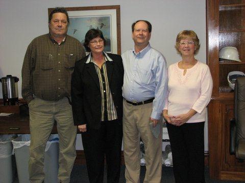 From left to right, an unknown colleague of my father's, the plant manager's secretary, my dad, Joe, and my mother, Joan