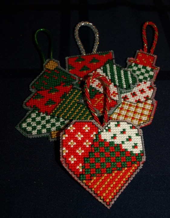 My fusible web backing technique needs a little work but for the first time I thought these plastic canvas ornaments turned out well.